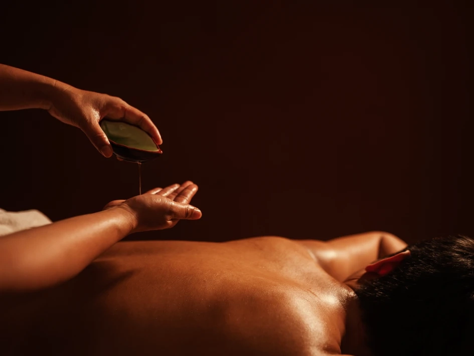 Photograph of a masseuse performing a “Gay Tantra Massage” service